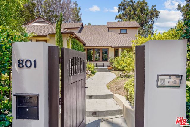 801 N Doheny Drive Beverly Hills, California Situated in highly coveted Beverly Hills, awaits this enchanting retreat. Move in today and enjoy your premier location, steps from iconic Sunset and Santa Monica Boulevard where you'll find top shops, restaurants, & entertainment. Set behind gates for maximum privacy, the home is enveloped by lush landscaping and greenery. The sweeping open floor plan allows for a seamless flow from the living spaces, dining room, and kitchen, all accented by oversized windows and sliding glass doors for direct yard access. From breakfast to dinner, enjoy your favorite meals in the kitchen with ample cabinetry, stainless steel appliances, center island, and breakfast nook. Additional home features include generous master suite with updated bath, well-appointed bedrooms, home office, and so much more. The resort-like yard is a private paradise with dazzling pool, spa, and BBQ for al fresco meals. Don't miss out on this remarkable opportunity for a corner lot gem in a prestigious locale.