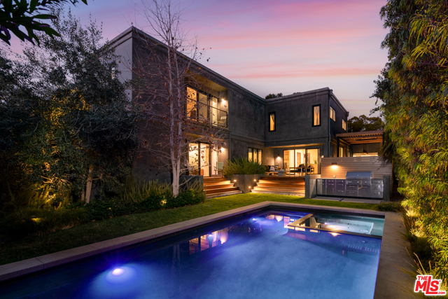 446 23rd Street Santa Monica, California Welcome home to this beautiful infusion of contemporary design with an architectural vision. Located North of Montana, this extensively renovated one of a kind property w/ a pool will take your breath away. //About this home: Situated on an 8,800+ sqft lot, soak in the architectural magnificence as you step into the main level and take in the natural palette and organic materials. Open and bright living space with a modern dual sided fireplace that is the center piece to the main level. You will see Marmol Radziner's vision through updates done to the kitchen, and outdoor space/landscaping, that translates into an outdoor oasis and entertainer's dream. 2 spacious bedrooms downstairs w/ 3 more upstairs including a master retreat that filled w/ natural light. //You'll Love: The sprawling deck, pool, and hot tub. Whether you are dining al fresco on or hosting friends and family, this property feels like home.// The Neighborhood: One of the most well sought after Santa Monica locations, you are seconds to the Brentwood Country Mart, restaurants, shops, and more.