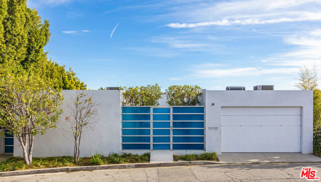 9010 HOPEN Place Los Angeles, California Inspired by classic Mid-century case study gems like the Stahl House this modern features Epic views over entire LA basin. Hopen Place is a quiet cul-de-sac on the 50 yard line in the Bird Streets. Triple prime in every way. Walls of glass open to large infinity edge pool with no immediate roof tops. Primary bedrooms is a world apart with direct access to pool and glamorous marble bath. 2 additional bedrooms are excellent for guests. Additional features include: cinema with windows into pool, gourmet kitchen and attached guest house. Private and secure, the ultimate view house in a stellar location.