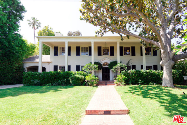 1717 CHEVY CHASE Drive Beverly Hills, California Secluded southern Colonial nestled on over 1/4 of an acre in the Beverly Hills Flats only 3 blocks from Beverly Hills Hotel! Approximately 5,000 S.F. of living space. Estate has beautiful hardwood floors, crown moldings, french doors, top of the line gourmet kitchen (2 New Miele Dishwashers/New Subzero Refrigerator/Freezer) with breakfast room with own sitting area. Gigantic balcony off master. Library with thoughtful built-ins, Huge formal dining room. The grounds are perfect for comfortable gatherings with pool, spa, grassy yard and 1000 s.f. guest house with full bathroom. Very private with tall shrubs surrounding front, sides of property and back yard. Home featured in Robert De Niro's movie, "What Just Happened."