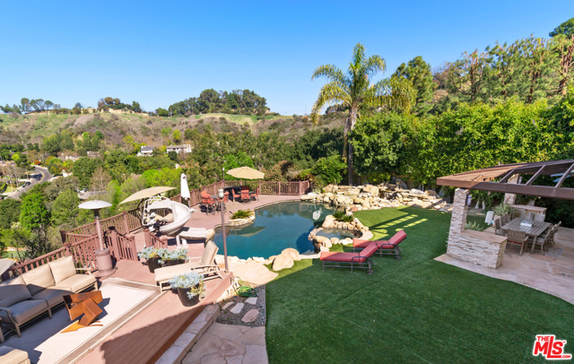 9722 Royce Court Beverly Hills, California Fabulous view home for in quiet cul-de-sac in Benedict Hills most exclusive neighborhood. Fabulous Master suite with spa bath, large chef's kitchen open to family room, separate living and dining room, stunning beamed ceilings and cool architectural design all combined with warm and inviting family feel. Dream backyard with canyon views, pool, barbecue and decks for fabulous entertaining. Coveted Warner Ave Elementary. No showings until after July 27th.