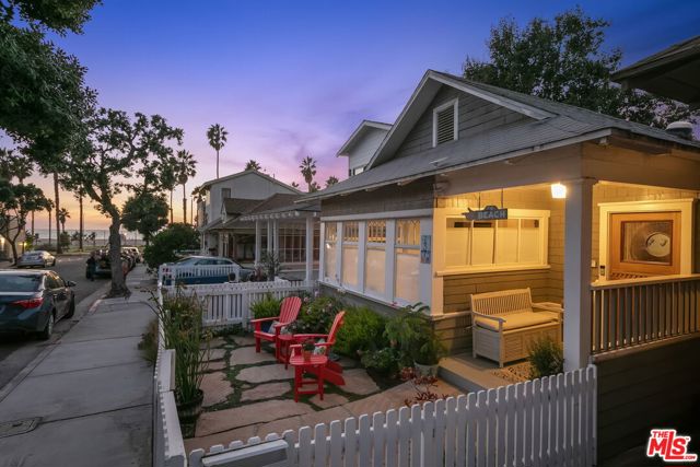 137 Hart Avenue Santa Monica, California Remarkable opportunity to live only a few houses from the beach on one of the most coveted streets in Santa Monica. Highly desirable enclave boasts quiet tree-lined streets w/homes rarely hitting the market & within steps of local shops, restaurants, entertainment, parks, bike & walking paths. Be greeted by a charming white picket fence & front patio for morning coffee while relishing the ocean sunrises. Inviting great room accented by vaulted ceilings w/wood beam detailing & endless windows for floods of light. Open kitchen w/ss appliances, double oven, island, wine storage & flows to the dining. Tranquil master w/built-ins, office space, soaring ceiling, walk-in closet & lux bath w/glass shower & dual vanities. Private & peaceful yard w/ample space for al fresco living enveloped by lush greenery. Includes extensive/efficient storage space, outdoor shower, & bonus space for office, art studio, etc. Take advantage of this once in a lifetime chance for an enchanting Santa Monica haven.