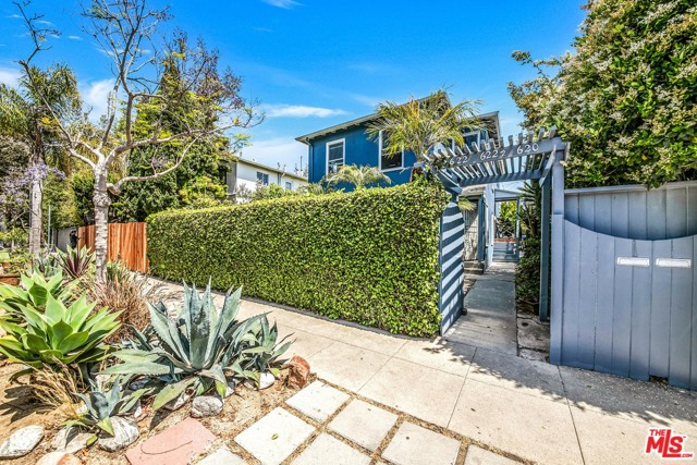 620 San Juan Avenue Venice, California Quintessential, beautifully maintained Venice triplex located on the coveted San Juan Avenue. Front building consists of 2 warm and inviting mirror image, lower and upper units, both 2 bedrooms and 1 bathroom. Ground floor, the owner-occupied unit has a newly remodeled kitchen and hardwood flooring throughout. Both units have surprisingly large closets, a separate laundry area off the kitchen with full washer/dryers, and large pantries. The back unit is a bright & airy one bedroom with a spacious bathroom, vaulted ceilings, and a huge skylight. French doors off the living area open up to a secluded patio area, perfect for morning coffee and evening relaxation. Beautiful landscaping in the front and courtyard area between the buildings. Two units can be delivered vacant (lower 2 bedrooms & rear 1 bedroom). The front upper unit is on a month-month tenancy. 5 car easy parking and up to 8 can fit, with an automatic gate off the alley. R-3 occupancy. True pride of ownership Venice property!