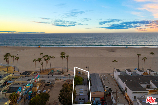 719 Ocean Front Walk Venice, California Location, Location, Location! Situated in an exceptional location with the beach in your front yard, this ocean-front duplex is a rare home that cant be missed. With unobstructed views, and only a few feet to the sand this spacious property offers endless opportunities. //About this home: Formerly a sculptors art studio and home, this property is a wonderful blend of space that offers endless options. Consisting of two separate structures, both encompass clean lines and contemporary details. The back unit offers high soaring ceilings and an abundance of light through multiple skylights. Upstairs is a large loft with a formal bedroom space, an ensuite bathroom. Downstairs you'll enjoy a spacious kitchen w/ built-in stainless-steel appliances, stone counters, and ample dining space to entertain. Sliding glass doors take you out into the courtyard, lined with bricks and surrounded by succulents. As you enter the front unit, the ground level is the perfect space for a studio, gym, separate office space, or works perfectly living space to compliment the upstairs. The 2nd floor features a fabulous living space with a lofted bedroom and a balcony/deck that looks directly at the ocean. //You'll Love: The flexibility this property offers! Perfect as a total beachfront investment property, or for an owner/user. Ready to go now or create your dream beach house!