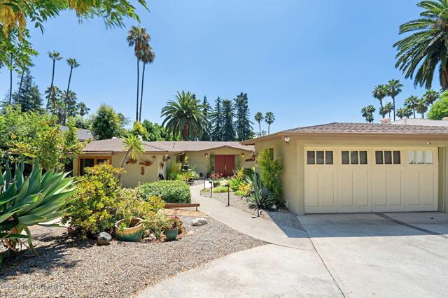 1548 E Altadena Drive Altadena, California Just bring your toothbrush! This sleek updated Mid-Century home with Bamboo Floors and walls of glass comes fully furnished. Elegantly appointed with a contemporary flare, the home comes complete with a baby grand piano, wonderful art and decorative accessories and is sited in a walled and gated compound on over half an acre near the Altadena Town & Country Club. The open floor plan includes a wonderful cook's kitchen with Viking, Sub Zero and Bosch appliances, dishes and cookware. There are four bedrooms and two and a half baths. The guest powder bath is located off the foyer and has easy access from the pool area. The primary bedroom is en-suite with French doors to the garden, custom stone surfaces in the bath and a generously sized closet. The fourth bedroom is furnished as an office. The pool and spa are located just off the rear patio with pergola. The expansive rear yard is completed by a grove of redwoods. This wonderful home is near nature trails and a short distance to shops and restaurants. This is a very rare opportunity to have a short term lease in such a special property.