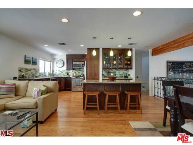 954 20Th Street D Santa Monica, California STUNNING 2BR/2.5 BA TOWNHOUSE. FLEXIBILE FLOOR PLAN IDEAL FOR WORKING AT HOME. DIRECT ACCESS PARKING WITH OVER SIZED PRIVATE 2 CAR GARAGE W/STORAGE. LIVING RM W/FIREPLACE, HIGH CEILINGS, PERFECT FOR HOME OFFICE. PLANTATION SHUTTERS. SECOND STORY GREAT/RM W/DINING ROOM & GOURMET KITCHEN, STAINLESS STEEL APPLIANCES, GRANITE COUNTERS & GLASS TILE. TOP OF THE LINE APPLIANCES COOK TOP, OVENS, REFRIGERATOR, WASHER & DRYER. OVER SIZED MASTER BEDROOM W/WALK-IN CLOSET AND LUXURIOUS BATH. UPSTAIRS LAUNDRY. OFFICE BUILT IN HALLWAY MORE SPACE FOR HOME WORK OR SCHOOL. PRIVATE PATIO. HARDWOOD FLOORS THROUGHOUT. PETS O. K. FEELS LIKE A HOME! CLOSE TO MONTANA SHOPPING AND DINING AND QUICK BIKE RIDE TO SANTA MONICA PIER AND THE BEACH. CITY RETROFIT FOR THE BUILDING WAS JUST COMPLETED. FRANKLIN ELEMENTARY. HOA INCLUDES EARTHQUAKE INSURANCE. Agent Remarks : washer and dryer included in as is condition no warranties. fireplace was built for wood burning and gas. Owners make no warranties on the fireplace