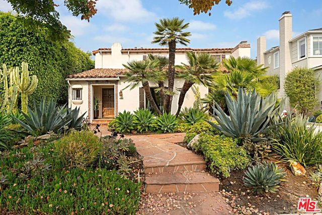 466 S Camden Drive Beverly Hills, California Amazing, unique, move-in condition 3,752 sqft Spanish home, situated on a 7,433 sqft lot w/pool. Fantastic sought-after location, just steps from Roxbury Park. The perfect center hall floor plan with large step down living room with beamed ceiling and fireplace. Expansive formal dining room that opens, with French Doors, to a covered patio. Gourmet eat-in kitchen w/Viking appliances. Entertainment room with temperature controlled wine cellar. Master suite and 2 additional generous sized en-suite bedrooms upstairs. Attached guest house opening out to large very private yard with pool. Additional features include: Built-in sound system, Creston Smart Home Tech System, 5 zones of central heat and air, alarm system. Beverly Hills City Schools.