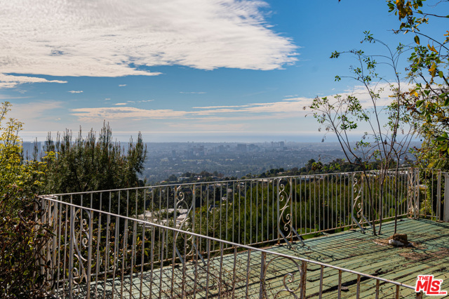 571 Chalette Drive Beverly Hills, California Unique opportunity to acquire a property in prime Trousdale under construction with spectacular views of the LA basin and ocean. The buyer can buy the property and finish it to their own taste. Much of the major construction has been completed while some of the finishes have not been done. The home has extraordinary scale, with a very open floor plan with pocket doors creating the ideal indoor outdoor flow, perfect for entertaining. There are dramatic sweeping views from the house and pool area. Large flat pad offers generous motor court which can be gated for privacy and security. The back yard has two large decks over the slope that could not be built today given current codes.