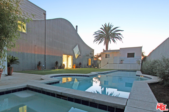 330 INDIANA Avenue Venice, California Architecturally significant former Dennis Hopper estate featuring main house designed by Brian Murphy, AIA. This property consists of two lots totaling approximately 10,550 sf. the corrugated metal exterior of the main house helps create magnificent open space and allows phenomenal light into this almost 5000 square foot, 3-bedroom 3-bath creative home. Adorning the main house is a very quaint 1909 1-bedroom 1-bath guest cottage, pool house, and large lap pool, enhancing the serene grounds of this hidden gem. The perfect location, which is close to Abbot Kinney and Main Street, Rose avenue and the famous Venice boardwalk. This is truly a Venetian compound that must be seen. A once in a lifetime opportunity to live in. FICO score must be at least 700 and no smoking in the property.