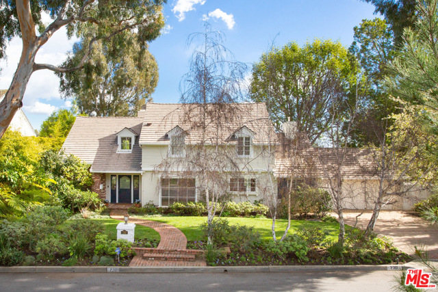 730 NAPOLI DR. Drive Pacific Palisades, California On the Napoli rim with tree framed views across the canyon to the sea, this beautiful traditional offers a perfect blend of updated chic with an East Coast vibe. French doors connect the beautiful family room to romantic decks for a candle lit dinner under the gazebo or a private swim under the stars. Plenty of nooks and crannies for study or work at home. Beautifully proportioned living room w/ fireplace, family room w/fireplace and bar, and large formal dining room. The light-filled master bedroom also has a fireplace, sitting/desk area, and private sun deck with views of the Pacific. Two additional large bedrooms, one facing the ocean with ensuite bath and the other facing the tree lined street provide separate spaces. Downstairs is a fourth bedroom/separate office with its own bath and separate entrance. Theres also a wine room, powder room, direct access garage, tons of storage and plenty of room to expand.
