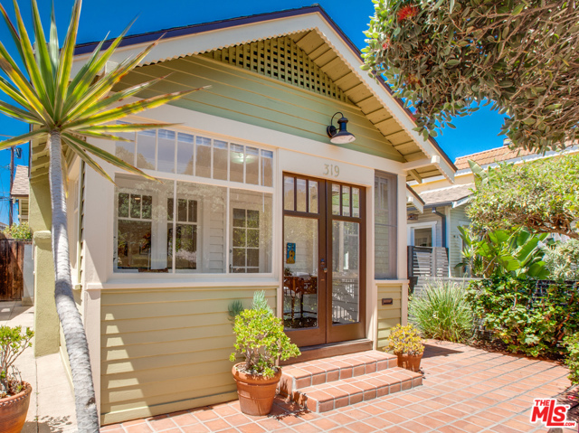 319 Windward Avenue Venice, California This fabulous home is the quintessential beach bungalow, situated on the pretty and charming third block of Windward Ave. With close proximity to both Abbot Kinney Blvd and the Beach, the location is one of the best Venice has to offer. This 2 bed / 1 bath home benefits from being recently remodeled, including brand new kitchen and bathroom, as well as refinished hardwood floors, painted throughout and a new roof. This wonderful beach pad is filled with light and air and the kitchen and master bedroom benefit from high pitched ceilings, with skylights, both with french doors, that lead onto the tranquil and superb Yard/patio area. This lovely courtyard area is both private and spacious, perfect for entertaining and relaxing. The property further benefits from excellent 2 car parking and storage spaces, which include a private garage and separate car port area, as well as storage room. This truly special beach bungalow has a happy, magical feel and is steps from all the best the Beach has to offer.
