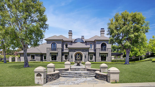 3131 Calle De Marejada Camarillo, California EXQUISITE Neoclassical Bella Vista Estates Home. A most elegant estate - ONE OF THE FINEST in Ventura County! Just under 5700 Sft. of Voluminous spaces: 4 Bedrooms, 5 Baths, Library/Study, Home Gym, Formal Living & Dining Rooms, and Gourmet Island CHEF'S Kitchen- designed with the FINEST of materials. Featuring TRAVERTINE flooring, CUSTOM MADE cabinetry made from the finest quality alder wood, 4 Fireplaces/6 Faces with Handcrafted Mantels and Surrounds of IMPORTED Marble, Wrought Iron French Doors, Dramatic GRAND formal living and dining rooms complimented by Central Dome Skylight. STUNNING Library/Study. CHEF''S KITCHEN with Natural Quartzite Stone Counters, Quality Appliances incl. Wolf, Sub Zero and more, and walk-in and butler's pantries beyond compare. HYDRAULIC ELEVATOR For Convenience and Ease. Headed Outdoors, The Feel of Privacy and Tanquility is captured within the GATED Phenominal Grounds. 100 tons of Hand selected Pennsylvania Stone Create Majestic Waterfalls & Ponds. Natural Stone Paths and decks at Veranda/Gazebo are accented by rolling lawns. Welcome Home! MATTERPORT 3D Virtual Floorplan and Dramatic Video Tours are available upon request.
