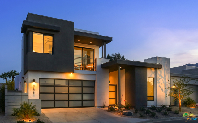 2655 Mystic Mountain Palm Springs, California Sophisticated and stylish 3-Bed, 3.5-Bath home epitomizing modern minimalism providing for a relaxed and hassle-free lifestyle. Generously proportioned great room features high ceilings, clerestory windows, and walls of glass opening onto the tiled outdoor living space complete with cocktail pool/spa, misters, fitted speakers and fire pit. The gourmet kitchen features custom cabinetry, fitted pantry, and Bosch and Fisher & Paykel appliances. The master retreat is located on the downstairs level and includes a spa-like bathroom, fitted walk-in closet and glass sliders opening to an outdoor shower and private patio. Upstairs is the second bedroom and bathroom, loft space (currently used as an office area), gym and two decks offering magnificent mountain views. The third bedroom is in the separate detached guest suite. This highly upgraded home includes low voltage light fixtures, remote controlled sunshades, tankless water heater, water conditioner, owned solar with two Tesla batteries, integrated security cameras, air-conditioned 2-car garage and much, much more.Community amenities include a clubhouse with large pool & spa, two dog-parks, bocce ball courts and electric car charging stations. An exceptional home for a discerning buyer!