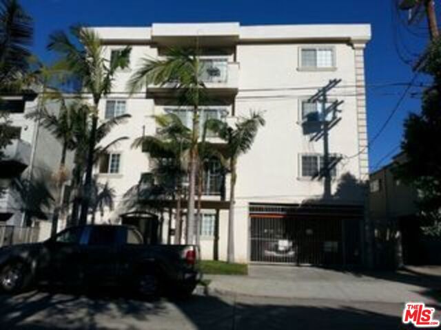 2114 Colby Avenue Los Angeles, California Colby apartments is a 3 story 9 unit over ground floor (street level) community garage elevator building. there are 3 units per floor front middle and back and unit 303 is on the top floor in the back. marble entry, 9' ceiling, granite counter top kitchen, tiled floors in the kitchen and bathrooms, laminate hardwood throughout (no carpet), central A/C, w/d and fridge in the unit, huge 16' x 35' living and dinning room with gas burning fireplace, large master bedroom with its own private bath and extra large walk in closet, second bedroom with walk in closet next to the master bedroom and the other two bedrooms with mirrored closets next to each other on the other side of the living and dinning room and they share 1.5 bathrooms, linen and guest closets , 2 parking stalls a lot of street parking too, close to UCLA SMC 10 and 405 freeways, tenants will move out the end of August, easy to show