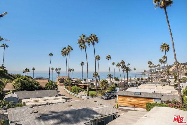 16321 Pacific Coast Hwy 93 Pacific Palisades, California Live directly across from Will Rogers beach in a beautiful ocean-view 2 bed 2 bath beach bungalow. Steps from the sand and minutes from Sunset Surf Break, the Palisades Village and seemingly endless hiking trails. Enjoy in-unit laundry, two-car covered parking, a community pool and spa and shared recreational space. The 924SF+/- home offers Southern California coastal living with breathtaking sunsets and ocean views from the comfort of home and outdoor dining deck. Cross walk, for beach access. Nestled in a quiet community of beach-life enthusiasts. This home is a must see.