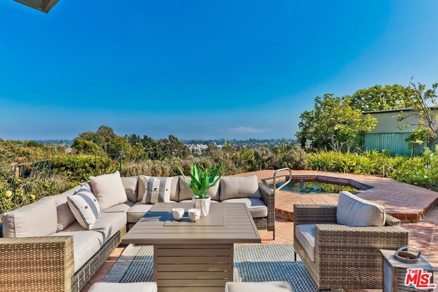 16116 ANOKA Drive Pacific Palisades, California HUGE PRICE ADJUSTMENT. Checks all the 2020 boxes. Ocean views on super-sized lot of over 27,000 square feet. Privacy galore, yet easy distance to Palisades Village and the beaches. Home office is a double sized space one level down, also with clear ocean views and private entrance. A serene mid-century architectural property, post and beam construction. Wonderful chance to move right in, or rent it now, while organizing remodeling or rebuilding plans. Huge living room facing the views with beamed ceilings and dramatic stone fireplace.Easy flow of the 3 bedrooms, kitchen with eating area and a large separate laundry room, front circular driveway for daily in and out ease. Rare package of big property, ocean views, and location just the right distance from boutique shopping, schools, world class restaurants, and the beach.
