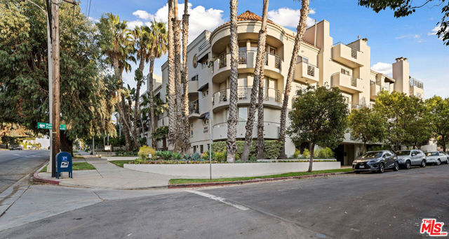 16040 W Sunset Boulevard 205 Pacific Palisades, California Stunning, light and bright designer corner unit in private 13-unit complex in the heart of the Palisades and within walking distance of The Village. No expense was spared on this fully-remodeled, beautiful contemporary featuring hardwood and marble floors and designer Italian cabinetry and countertops. The blissful gourmet kitchen features white lacquered Ernestomedia cabinetry, Caesarstone countertops and Bertazzoni appliances. Past the formal dining area, is the airy living room featuring a fireplace and spacious private balcony to take afternoon tea amid the nearby ocean breeze. The master bedroom features its own private balcony, walk-in closet and a spacious Zen-like, en-suite full bath with double sinks and a large soak-in tub. A second bedroom featuring built-in bookshelves has direct access to a second full bath, which can also be accessed by guests through a separate entrance. Convenient, in-unit laundry and two parking spots round out this prize of a property.