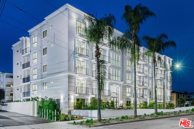 1237 S Holt Avenue 502 Los Angeles, California Welcome to the Regency Holt, a brand new construction complex in the the Pico-Robertson Neighborhood. This corner PENTHOUSE unit has 2 outdoor balconies and is conveniently located in the Southwest of the building near the elevator and has 10-foot ceilings, an open concept kitchen, and a large combined living room and dining room. The floors are grey wide plank oak with a slight hint of blue hues. There is a powder room for guests and 3-bedroom suites. The master bedroom has its own private master bathroom and a walk-in closet. New construction, with energy-efficient insulation and Anderson double pane windows. Building Amenities include 22-Foot lobby entrance, Gym, bike storage, security cameras, and controlled access. This unit as well as other units in the building are available either short term (Furnished) or for one year leases. **A Must See**