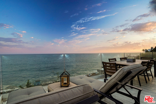17015 Pacific Coast Highway 7 Pacific Palisades, California Tucked away in the charming Malibu Village community, this cozy beach cottage boasts breathtaking, unobstructed ocean views. Natural light floods through its floor-to-celing glass doors that open up to a private deck. The meticulously maintained home features three bedrooms, two full baths and a spacious kitchen. Enjoy a short stroll over to the serene community swimming pool and clubhouse. Moments from Bel Air Bay Club, the coastline bike path, Los Liones and Temescal Canyon hiking trails, and fantastic shopping/dining at the Palisades Village. 2 parking spaces.