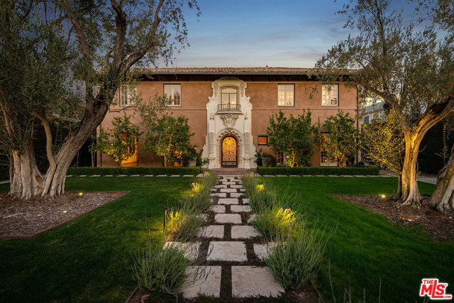 440 S Arden Boulevard Los Angeles, California Unparalleled in design, scale and proportion, 440 South Arden is reminiscent of a Tuscan villa, a truly stunning property! Perfectly situated in the center of the block, and blocks away from Larchmont Village, this estate has been meticulously renovated from the ground up. Foyer entry takes you through French doors, leading to the spectacular gardens, patio replete with a majestic fireplace, pool, hot tub and an incredible guesthouse. The subterranean level has been transformed from a speakeasy to a state of the art screening room, bathroom, sous-kitchen/laundry room, office/bedroom or gym. As one enters into a dramatic foyer, the formal living and dining room await, in addition to a chef's kitchen, maids plus bath and elegant library. The top floor has a wonderful master suite with walk-in closets, magnificent bathroom and balcony, which overlooks the pool and gardens. Two other generously sized ensuite bedrooms and baths, plus an upstairs family room, complete this one of a kind property.