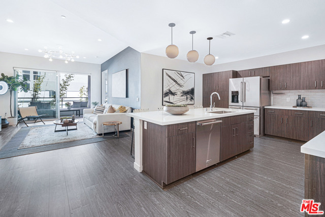 4140 Glencoe Ave 509 Marina del Rey, California Magnificent, modern loft in Marina del Rey, at the X67 Lofts built in 2016! Single level with hard-surface floors throughout, high ceilings and traditional-style bedrooms. This 2BR/3BA home features top-of-line finishes, custom California Closets and designer light fixtures. Desirable and private end location, facing east and extremely quiet. An oversized, covered balcony extends from the living area to the master bedroom, perfect for both al fresco dining and entertaining. You will marvel at the large gourmet kitchen with giant center island, stainless steel appliances and white quartz counters. Large walk-in shower with floor-to-ceiling tiling, dual vanity sinks, massive walk-in closet and extra linen storage closets. Separate Washer & dryer in-unit. 2 parking spaces in gated garage. All the modern conveniences in the best MDR loft community! Located in the Marina del Rey Arts District, this is an upscale condominium project with outdoor pool, fitness center, concierge and community rooms.