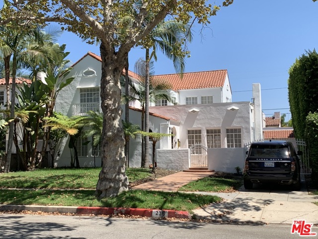 236 S Rodeo Drive Beverly Hills, California 2 Blocks from trendy S Beverly Drive and the 'famous' Beverly Hills Triangle of shops, cafes, museums and more, this gorgeous classic spanish is move-on ready. Den has under stair 'bar'. Upstairs has 3 bedrooms/2 baths. 1 full and 1 half bath downstairs. The interiors have been updated (including new A/C) for ease of flow and terrific entertaining. Large windows abound with oversized French doors and archways. Hardwood floors and beamed ceilings complete the Spanish feel. California easy indoor/outdoor dining and flow. All rooms are light and bright. The huge yard with pool and converted garage for yoga, office or recording studio, is ready for your next party! A large pergola shades the saltillo-tiled patio. This is Beverly hills living at it's finest in architecture and location.