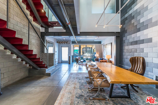 1212 Abbot Kinney Boulevard #C Venice, California Located in the heart of Venice on vibrant Abbot Kinney Blvd, this is the ultimate modern live/work space. Perfect for your home, gallery, studio or office. This Eco-friendly artist loft is complete with 3 levels, infused with natural light and encompasses architectural details throughout. Designed by the renowned Equinox Architecture firm, the open floor plan with 3 bedrooms, 3 bathrooms boasts sky high ceilings, custom built-ins, chefs kitchen, radiant polished concrete and bamboo floors. Relax, work or entertain on the rooftop deck with amazing panoramic city, mountain and ocean views. Private 2 car garage, security system. Also available for lease.