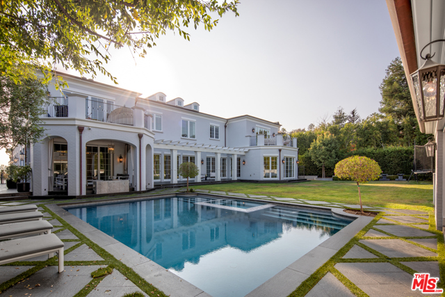 130 S Burlingame Avenue Los Angeles, California Beautiful Traditional located south of Sunset in Prime Brentwood Park. This 13,000 square foot estate is prominently situated atop a natural bluff with views to the ocean. Boasting a total of 7 Bedrooms, 12 baths, huge master bedroom with his her baths and closets, movie theater, wine room with dining area, gym with steam room and sauna, large flat yard, putting green and outdoor covered cabana, this home built in 2017 leaves nothing to the imagination. With Privacy and additional security features, this Brentwood Park Traditional offers all of the amenities you could ask for while being walking distance to the Brentwood Country Mart.