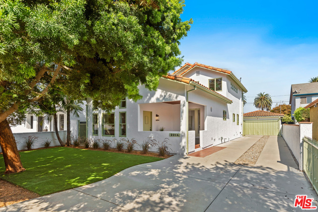 2214 Penmar Avenue Venice, California Meet Your New House! Terrific 6360 sq. ft income lot hosting a fabulous 3 bed, 3 baths, 2382 sq ft home with a flabbergasting detached 1-bedroom 800 sq. ft. guesthouse with vaulted ceilings, kitchen, sky lights, and full bath. This light-filled stunner showcases a mix of eclectic finishes producing a sense of style and ease with lots of room for everyone. The lower level initiates a cohesive floor plan with an open kitchen-living-dining area, wood-burning fireplace, 2 bedrooms, 2 baths, with family room that opens to a secluded room-for-a pool backyard with fruit trees and large deck boosting the experience of living outdoors. Upstairs, private master suite with vaulted ceilings, fireplace, dreamy walk-in closet, spa-like bath with bidet, and private toilet room plus private sitting room adjacent to the upstairs balcony. Ideally located in a hip-family friendly neighborhood providing quick easy access to trendy cafes, shops, gourmet stores, Venice Beach, and the whole cultural scene.