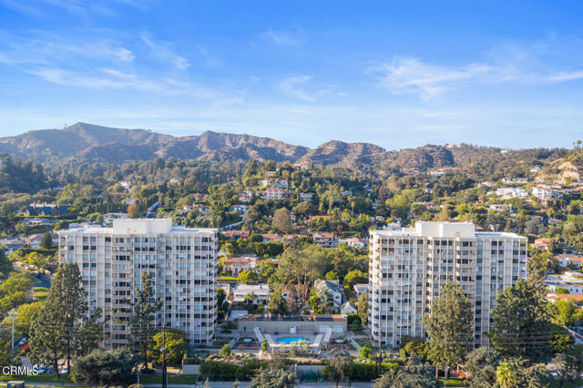 4455 Los Feliz Boulevard 1007 Los Angeles, California Epic Views bring a sense of Grandeur to this Luxurious One Bedroom Plus Den condominium home located on the 10th floor corner of the iconic Los Feliz Towers. The Open floor plan layout provides free flowing spaces from the formal living room and the dining area into the spacious balcony overlooking the entire City below, the Griffith Observatory above, and to the magnificent Skyscrapers in Downtown LA and beyond. Interior Highlights include updated remodeled kitchen , stainless steel counters, wine refrigerator, granite top display cabinetry, remodeled bath, newly painted walls, recessed lighting, ample closets, built in cabinetry in Den, Two deeded parking spaces in the community garage and an assigned storage space. HOA amenities include: Impressive Formal Guest lobby with 24 hr. security personnel, mail room/package delivery ideal for those who often travel, guest parking, community laundry room, spectacular outdoor grounds with beautiful sun decks pool terrace, outdoor lounging areas, gym, sauna, and social/rec room. Sitting at the foothills of the Hollywood and Los Feliz Hills, this stunning Pied-a-Terre is close to the nearby Neighborhood attractions, the Griffith Park, the Observatory, and the Los Feliz Village.