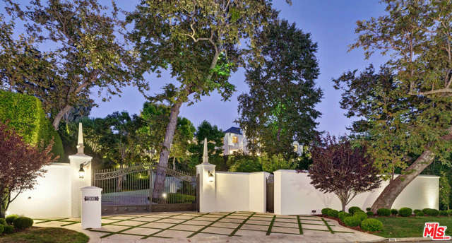 300 STONE CANYON Road Los Angeles, California Prominently sited on apprx. 2 verdant acres in lower Bel Air best location and set behind an impressive, gated entrance w/400ft of street frontage, this majestic white-brick Georgian overlooks sweeping treetop views & the Bel Air Country Clubs scenic golf course fairways. Spanning appx.17,000sqft w/8 BRs, Theater, Gym & 13 BAs including a fabulous 2BR, 2.50 BA, 2,000sqft complete Guest House. Custom built in 2004 using the finest quality construction, & bathed in natural light with a well-designed 2-story floorplan of timeless style & refinement with stately classic details, substantial scale, high ceilings & groin archways, limestone & walnut HW flrs, eight fireplaces & slate roof. Sprawling park-like grounds, specimen trees, rose gardens & lushly landscaped backyard w/70ft swimmers Pool & Spa. Gracious & elegant, the Living Rm, Card Rm, stunning Library & grand formal Dining Rm are an ideal backdrop for entertaining. A fabulous Family Room adjoins a large, well-equipped Kitchen & Butlers Pantry. Magnificent Main Bedrm Retreat w/appx 3200sqft includes 2 offices, sitting rm, 2 luxurious his & hers baths & huge walk-in closets. Plus, 3 spacious ensuite bedrooms, staff room & private staff apartment. Expansive motorcourt, 5-car garages & onsite parking for apprx. 50-cars completes this rarely found trophy property & one of the most admired estates in LA.