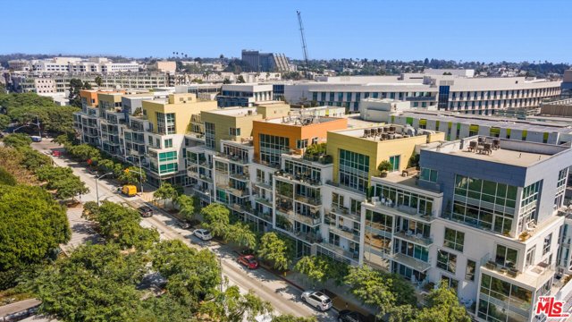 1705 Ocean Avenue 106 Santa Monica, California Large 1 Bedroom with a den 2 Bath, Modern, Elegance, located at the exclusive Waverly Complex! Ground floor entry with Second floor master! excellent living space with an open Kitchen, designed by Marmol Radziner appointed with quartzite counters, oak cabinetry and Thermador SS appliances; master with large walk in closet and spa like bath with separate tub, stall shower. Additional features include: Washer and Dryer in unit, fully equipped fitness center, concierge at Lobby, Sunset views from the exclusive residents-only Skybridge Lounge with kitchen, FP and Ocean Views! Two side by side secured parking & beach shower at street level. Truly a Must See!
