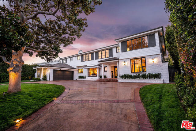 1027 Napoli Drive Pacific Palisades, California Perched on a prestigious street in Pacific Palisades, a warm and charming traditional home invites you to live your best life inside. Expanded and remodeled in 1999 by Brentwood Homes. Circular driveway and grassy knoll leads to a 5,861 sqft estate with 6 bedrooms 6 bathrooms. The foyer opens nicely to a spacious and comfortable formal living and dining rooms, maple cascading hardwood floors throught-out flows nicely to adjacent chef's kitchen with a spacious island, high quality stainless steel appliances, travertine countertops, beautiful cabinetry and adorable breakfast nook near an stunning sunlit family room with floor to ceiling windows and skylights. French doors open up to the backyard with a fresh grass lawn, brick patio and a built-in outdoor fireplace, all surrounded by beautifully lit ficus (soon to be a tall hedge) olive trees, rosemary, and lavender exhibited throughout the exterior. Don't miss this opportunity to invest in a crown jewel on Napoli Drive in the Riviera. Become a member of the golf or tennis club and walk the famous neighborhood and enjoy living in the Pacific Palisades.