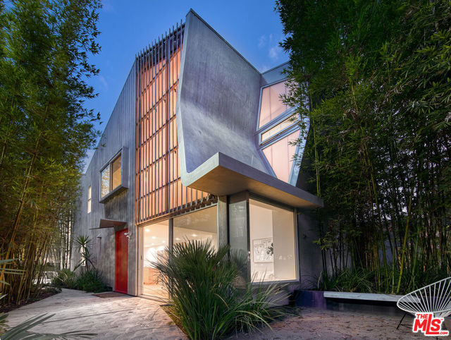1038 Bay Street 102 Santa Monica, California Do not miss this stunning, Carbon Neutral, Architectural masterpiece, designed by award winning Architect, Kevin Daly. This one-of-a-kind, custom, private, gated oasis, is located in a prime tree lined street of Sunset Park, Santa Monica. Unlike traditional townhomes, this grand 2,400SF property runs the length of the entire lot (front to back), making it feel like a true single-family home. Enjoy multiple private outdoor spaces for relaxing and entertaining (all flowing seamlessly for a proper indoor / outdoor experience). Property features 3 bedrooms, 3 bathrooms plus upstairs office/flex room and open den/ family room area. Created to embrace the movement of the sun, enjoy all the natural light that seeps into all the open living spaces. Other details include private large 2-car garage with alley access, additional custom storage, solar hot water and heated terrazzo, cork and patio floors, Western sliding doors, Wolf/ Subzero kitchen appliances and hardwood stairs. Short walk or bike ride to both Main Street and Abbot Kinney Blvd shops, cafes and restaurants. Located blocks to Whole Foods, Gelsons and more. Additional features provided by Seller include the following: Carbon Neutral is balancing greenhouse gas emissions by offsetting or removing from the atmosphere equivalent amount of carbon for the amount produced to build and operate the home. It is an off-set. Carbon Neutral intentions/design features include: Temperature control: Motorized ceiling vents for temperature regulation in addition to a/c. Granite floors on the first floor help maintain the cool temperature during the summer and can be thermally heated in the winter. Cork floors on the second floor are thermally heated from solar panels on the roof. (Please note that the solar panels do not provide electricity currently, they only provide thermal heat for the floors inside and outside. Tankless water heater maintains shower ready heated temperatures. Electrical and technical mentions: The garage has an electrical unit to outfit for an electric car. Multiple wifi sensors throughout home given the density of the walls. Security: Nest doorbell and security camera overseeing the area behind the garage added, ADT Alarm System Garage: Custom built door to accommodate the slope in the street. Custom built storage within the garage has a hidden key lock system with sliding doors. Light maximization: Vaulted ceilings pick both up and reflect in exact opposition to the adjacent unit so that maximum light is achieved in the upstairs from the East and the West. Privacy: Central Terrazzo allows for privacy between the front and the back entrances and living areas of the home while keeping the continuity of the house maintained with the hallway. There is an ease of moving throughout the home privately from the inside. In contrast to many of the modern properties in Venice with the ADUs outside the main house. Mature bamboo along the entire side of the house as well as on both sides of the front garden add to the street barrier. Customized Highlights: Kitchen-Kevin Daly custom-built maple cabinets, with signature use of stainless steel in the kitchen. Closets-Kevin Daly designed maple closets that match wood cabinets in the kitchen. Bathrooms-Marble countertops, handpicked by the architect.