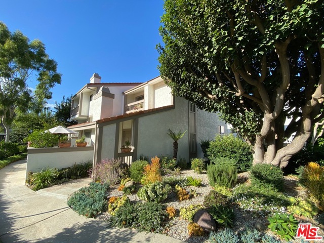 17104 Palisades Circle Pacific Palisades, California Beautifully updated three bedroom town home in the serene Palisades Highlands. This extremely light and bright end unit has high ceilings in the living room opening to the patio and hardwood floors throughout the home. Updated kitchen with Cambria quartz countertops and stainless steel appliances. Two of the three bedrooms are upstairs and one is downstairs that is currently used as an office with desk and built ins. Two car attached garage, washer and dryer downstairs. The Highlands offer great hiking, dining all surrounded by amazing mountain views. Palisades HOA 5 offers a pool, spa, fitness room and a grassy play area.
