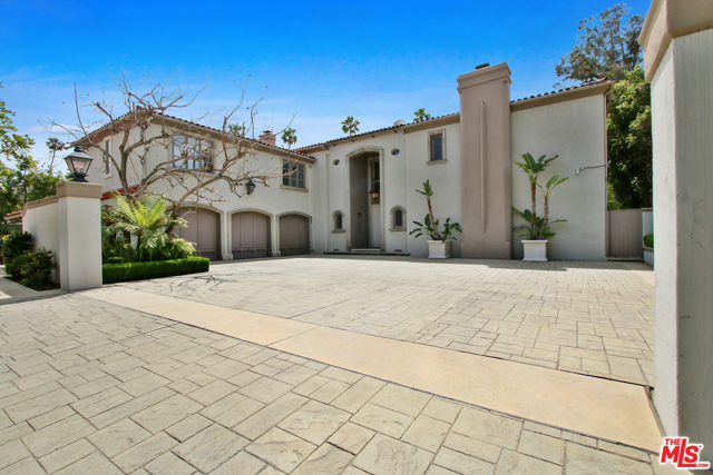 903 HARTFORD Way Beverly Hills, California Stunning, gated estate. Centrally located, just north of Sunset Blvd, one block west of the Beverly Hills Hotel. This spectacular property has 6 true bedrooms, all generous in size and en-suite. Easy access, to the Strip, downtown Beverly Hills, etc. This elegantly designed contemporary boasts a private resort pool, lighted tennis court, sauna, and library. Enjoy the generous family room that opens to a breathtaking backyard, featuring an inviting swimming pool w/spa & loggia lounge area. The second floor you will find the spacious master suite with its own private balcony. This is a must see. text today for a private showing. This is the home you have been waiting for.