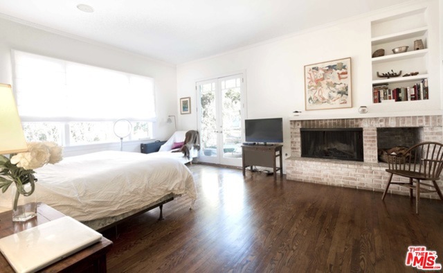 Romantic Master Bedroom with fireplace and balcony