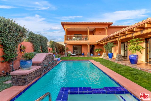 1233 Vienna Way Venice, California Major price adjustment! Bespoke Spanish villa on coveted 10,000+ sq ft lot in East Venice. Noteworthy features include an auto turntable for front-facing driveway exit, a Tesla EV charger, handmade Mexican terra cotta floor tiles and Talavera accent tiles, elevator access to the main suite, heated floors throughout, an entertaining cabana off the heated pool/spa, enormous ceilings, clerestory and picture windows to bring in ample natural light, plus multiple indoor/outdoor access points to take advantage of our beautiful climate. Kitchen was just updated in August 2021 by opening up the wall between the cooking area to allow for an eat-in counter. Mature citrus trees in front and lush landscaping enhance the resort-like feeling throughout the property. Conveniently located just minutes from Erewhon, Whole Foods, Venice Beach, the 10 freeway, Superba, Deus Ex Machina, and more - this property epitomizes California living. Priced to sell - owner is ready for offers!