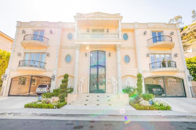 1455 Robmar Drive Beverly Hills, California Gorgeous modern home in Beverly Hills Post office* 8675 SqFt 5 Br 7 Ba gated and secured castle* high-end custom upgrades and improvements throughout* Private pool, spa, waterfall, * 5 balconies, 4 fireplaces*French/Italian architectural style and appeal* High quality marble and hardwood flooring throughout* Marble baths, large jacuzzi in the master suite, built-in sauna/steam room in the master bath* recessed lightings, crown moldings, custom artwork and mosaic finish and design on interior and ceilings* Elevator, central A/C,3 car garage w 4 carport in the building* Concrete and wrought iron fencing* Interior lot located on a short, semi-circle street with wonderful neighbors*;Hills, greenbelts and view, Peaceful canyon view from the Master Bedroom* And many more & more* You need to see this great entertaining home* https://vimeo.com/543852367 is video tour link.