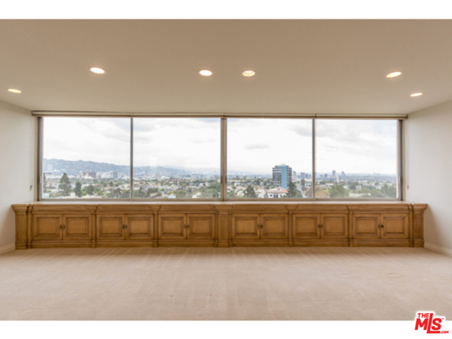 2222 AVENUE OF THE STARS 704 Los Angeles, California Breathtaking, unobstructed, North/Eastern views of Downtown Los Angeles, Beverly Hills, The Hollywood Sign, and Century City too! Hard to find, corner location, 3 bedrooms, 2.5 baths and 2 balconies. Remodeled condo with gorgeous custom maple cabinets throughout providing fabulous storage. Dazzling granite kitchen plus very pretty baths and powder. Balcony off 2nd bedroom and 3rd bedroom. Full service building, pool, tennis, valet and fitness center. So very easy to show. Minimum one year lease. One dog with 25 pound limit.