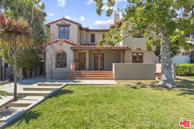 1125 Monument Street Pacific Palisades, California Ideally located just a block from the iconic Palisades Village, this classic Spanish home offers opportunities for gracious entertaining both inside and out. Access all the Village shops, restaurants, schools and amenities within minutes. A carved wooden front door and arched entry welcomes you into the formal living room with fireplace and French doors to the front patio. The romantic dining room also has a view to the front. There are wood floors throughout. The cook's kitchen provides Viking stainless appliances and marble countertops, with a breakfast bar and separate breakfast area. There is a bedroom on the first floor being used as an office plus a bath/powder room. The family room with fireplace opens to the backyard, which includes a swimmers pool plus spacious patio areas for dining and entertaining. At the top of the stairs there is a large landing with seating on both sides. The master suite with views to the backyard includes a sumptuous bath with double sinks and a walk-in closet. There are three additional guest bedrooms upstairs. The newer garage has been converted into a fabulous studio with high, open beam ceiling and an attached bath, plus outdoor shower. There is parking for two cars on the driveway.