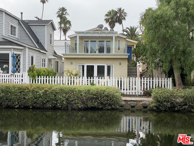 422 Carroll Canal Venice, California Incredible opportunity to acquire a rare 2-story duplex on an island fronting the Venice Canals! Rebuilt from the studs in 2004, each home is approximately 900 square feet with two bedrooms and one bath, updated kitchens and bathrooms, and wood floors. Both residences have French doors to private outdoor relaxing spaces allowing natural light and ocean breezes to flow. The upstairs flat opens to an expansive terrace overlooking the canal; the downstairs opens to a canal-front deck and yard perfect for entertaining and indoor-outdoor living. There is ample parking 5 total spots. Each unit has a private garage and laundry area. This duplex is an excellent prospect for an owner-user or an income property in one of Venice's most desirable locations on the historical Venice Canals only four blocks to the beach, and Abbot Kinney with its many upscale boutiques, shops, fine dining. The buyer has a blank slate as both units are vacant. Rent out both flats with $100k+ income; live in one and rent out the other; or use all for a single-family abode. Coeur d'Alene Elementary School District.