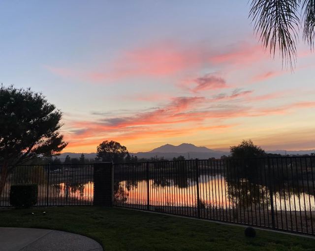 27 E Country Club Dr Brentwood, California Breathtaking views of Mt. Diablo & colorful sunsets from this incredible property located in the Shadow Lakes community, perfectly nestled on the west end of Brentwood. This stunning home boasts a bright and open floor plan with a main floor library and bedroom. The remodeled gourmet kitchen is filled w/natural light and is perfect for entertaining with a large island, Thermador & Bosch appliances, and quartzite countertop. The tropical backyard with pool and spa is the perfect escape from distance learning and work. Pride of ownership exudes from this beautiful colonial style home as it is in incredible condition and move-in ready. New carpeting (Sept. 2020) and a remodeled upstairs bathroom (Sept. 2019) makes the home feel new, yet the 36+ mature palms and trees throughout the property provides the privacy and comfort only available in an established home. Close proximity to the top schools and only minutes to the freeway.