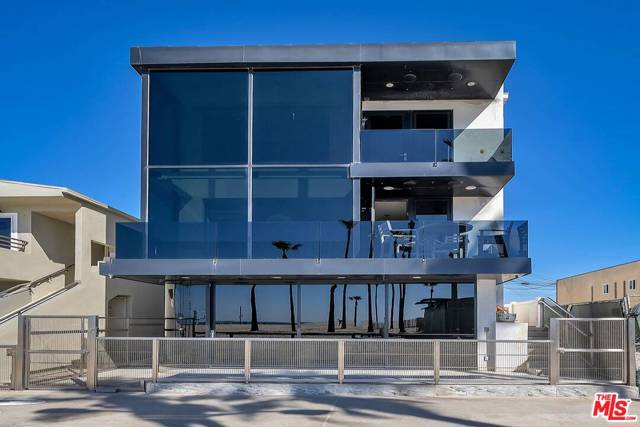 3009 Ocean Front Walk Venice, California Now is your chance to own on the World-Famous Venice Beach Boardwalk with this spectacular, one of a kind 2 story beachfront condo! This is a very rare opportunity to acquire a custom built from the ground up, modern and sleek, architecturally stylish beach property. This has 2 story, 2 Bedrooms, 2 Baths. The main living area features an ocean front living room with wood and gas fireplace and adjacent custom kitchen with built-in appliances including a Sharp microwave drawer, GE Profile Convection Oven and gas range, Kitchen Aid dishwasher, a 30 bottle wine refrigerator and Miele Coffee Maker. Handpicked Birdseye maple cabinetry throughout the kitchen and granite counters as well as a large pantry is a bonus. The Dining area is wrap around glass with views from Palos Verdes to Malibu. Step out on the corner balcony and adjacent walkway for a nice spot to have lunch or a sunset cocktail. Continue back to the built-in bar and 100 bottle Avanti wine refrigerator and sound system equipment cabinet. Watch the sunrise and sunset from the beautiful glass windows. Then go up to the roof for a BBQ and Panoramic Ocean Views!