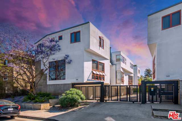 345 Rennie Avenue 3 Venice, California Gorgeous, contemporary townhome in the heart of iconic Venice Beach with a coveted roof top deck for endless al fresco living. Gated and secure, the home offers a private garage and is just steps to trendy Rose restaurants, Main Street, and the beach. Enter to a welcoming open floor plan for a gracious flow through the kitchen, dining, and living spaces accented by a fireplace and grand windows for an abundance of California sunshine. Cook up your favorite snacks and meals in the sleek kitchen with stainless steel appliance, ample cabinetry, and breakfast bar. Be led to the second level where youll find a bedroom, perfect for office, nursery, or guest space, and the well-appointed primary suite with luxurious bath and direct balcony access. A true coastal dream, this Venice Beach oasis has everything you are looking for!