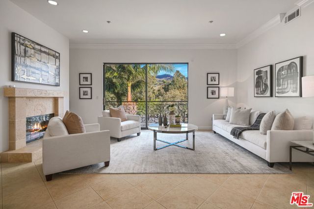 16000 W Sunset Boulevard 302 Pacific Palisades, California Beautiful and spacious Penthouse with 1,900 square feet includes rare, 2 bedrooms plus office, which could be 3rd bedroom, each with its own sliding door balcony. The building includes open-air walkways and courtyard, which is very desirable now. High ceilings throughout with tons of natural lights. The Kitchen features Sub-Zero fridge, Viking range, Bosch Dishwasher, granite countertops and sleek white enamel cabinetry. Kitchen opens to the spacious Dining and Living Room with fireplace. The master bedroom includes beautiful spa bathroom with soaking tub, separate shower, double sinks and a large walk-in closet. With cat5e cabling, Lutron bridge and Wemo light switches, a homeowner has tools to expand their home automation needs. The condo includes a washer and dryer in the unit along with 2 underground parking spaces and additional storage. Situated just minutes away is the Palisades Village, Pacific Palisades Sunday Farmers Market, scenic hiking trails and the beach