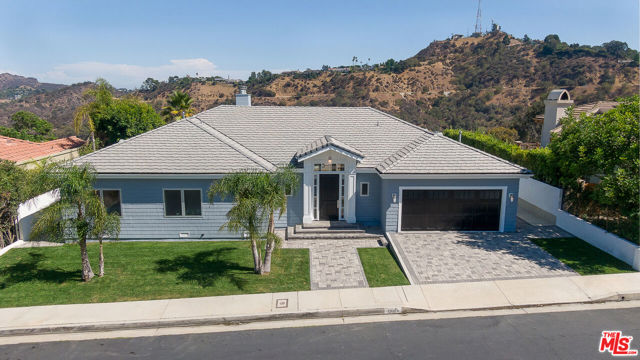 12024 Summit Circle Beverly Hills, California Beautiful turn-key remodeled traditional home with unobstructed expansive canyon views in the exclusive gated enclave of The Summit. Stunning formal living room with a new fireplace and new contemporary style mantel. Striking kitchen with Sub Zero/Wolf appliances replete with wine fridge and marble counter tops. Primary bedroom with a new fireplace, new mantel, huge marble bathroom and a walk-in closet; second bedroom with a bright sun-filled bathroom and a jacuzzi tub. Third and forth bedrooms share a large bathroom with a walk-in shower. The owners just finished an extensive renovation this year and no one has lived in the house since: new large IPE deck with new glass rail, new pavers in both alleys, new sprinkler system and new grass in the front yard, new privacy wall on both sides of the house, new Fleetwood windows throughout with screens, brand new HVAC system with hospital-grade air purification system Perfect 16 with NEST controls and 5 zones, new insulation of the attic and below the house, brand new sister foundation plus enforced retrofitting, gorgeous brand new bathrooms with special order Duravit vanities, jacuzzi tub, German faucets and wall-mounted Duravit toilets, bidet, Spanish tile, light fixtures and outlets/switches were replaced for new, brand new closets in bedrooms, new storage cabinets, shelves and bike rack in the garage, newly installed ADT alarm system and new fireplace/mantels and new outdoor lights. This is a must-see and gorgeous home!