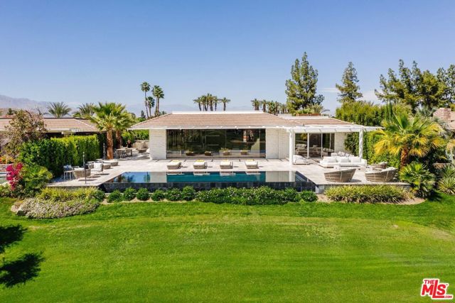 20 Johnar Boulevard Rancho Mirage, California Quintessential Rancho Mirage lifestyle in the highly desirable Morningside Country Club. Designed by desert icon Steve Chase, this immaculate home features walls of glass and voluminous ceilings, perfect for showcasing the explosive and unobstructed mountain views and lush fairways in one of the valleys most in demand clubs. Work from home with a large office/den which leads to a newly designed pool and sitting area. The primary suite features dual bathrooms and walk-in closets with versatile lounge area. Two additional guest suites offer privacy each with en-suite bathrooms and patio access. From the infinity edge pool to the built-in fire pit and full outdoor kitchen, this Morningside Country Club home is ready for you.
