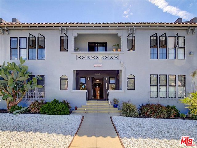 2050 Dracena Drive Los Angeles, California A classic Spanish Revival building, 2050 Dracena Drive brings a unique opportunity. The 20-unit multifamily building is located on a large, 11,240 SF lot at the center of Los Feliz, near a multitude of local restaurants and shopping including Albertsons, Blue Bottle Coffee, Cafe Los Feliz, Freds, and Alcove Cafe. The property is master metered, allowing annual 5% rent increases. The unique layouts of the units provide tenants with ample storage space, with some units featuring a walk in closet, den, and large pantry. The entire building boasts original hardwood floors, individual AC units, open living space, full designer bath and modern kitchen with butcher block counter tops. Griffith Park, Silver Lake Reservoir, and Hollywood surround the property on each side, providing residents the ultimate East LA location.