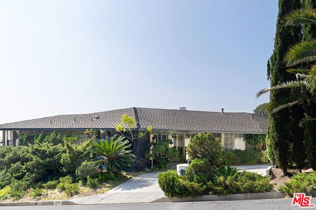 1499 CARLA Beverly Hills, California Classic 60s contemporary with panoramic views in a great Trousdale location. This single story, spacious 4 bedroom, 6 bathroom home with pool and sauna is situated on a large flat lot with walls of glass and is the perfect example of gracious indoor/outdoor living whether for entertaining or as an idyllic retreat for todays lifestyle. This lovingly cared for home has great upside potential and is ready for your decorators touch to make it your own! It has many special architectural features, a wonderful open feeling and is priced to sell. Easy to show. Call for your viewing appointment and follow Covid protocols.